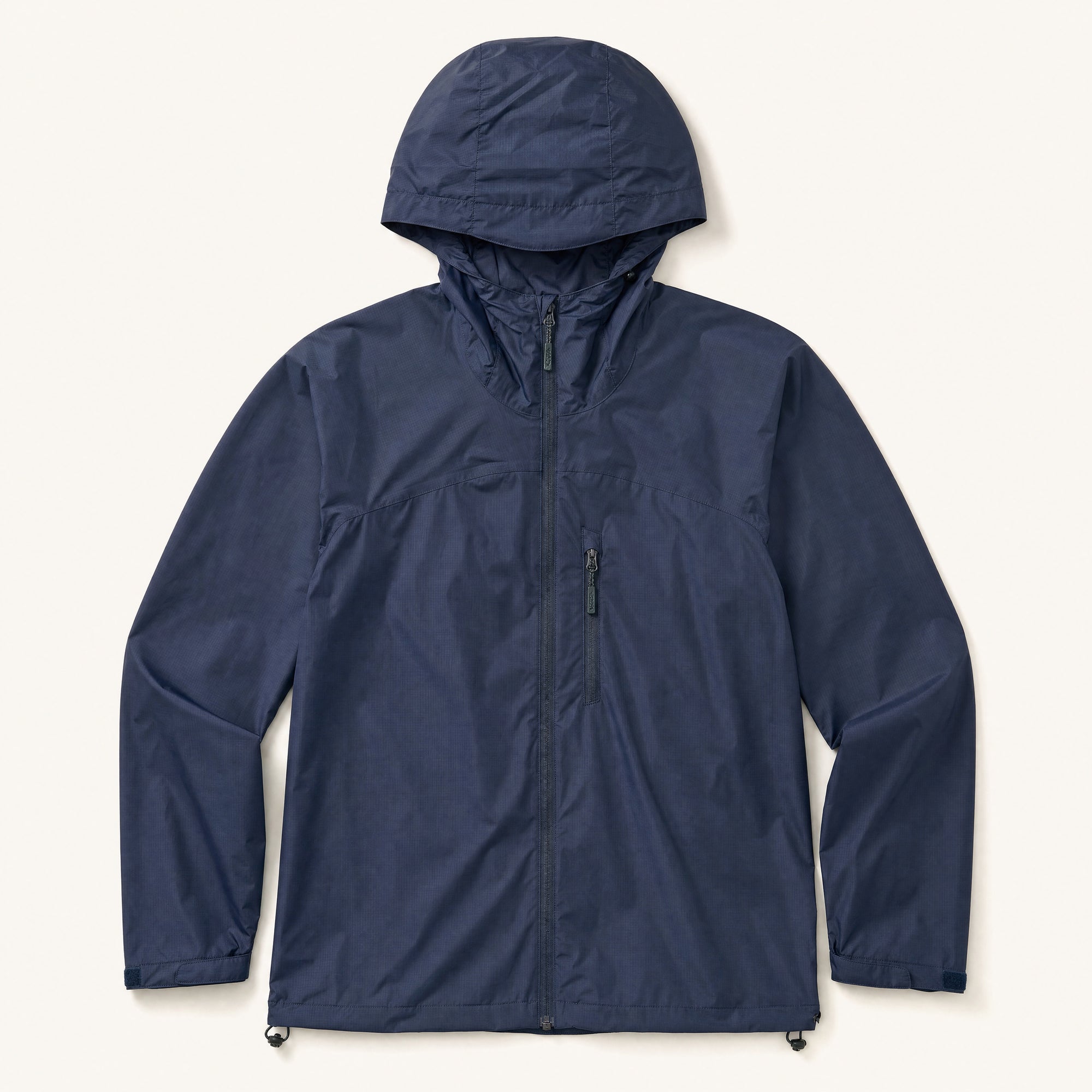 The Gale Men's Lightweight Hooded Shell Jacket in Storm Navy, front flat lay