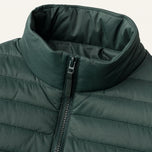 The Treeline Men's Quilted Puffer Jacket in Pine Green, detail close-up